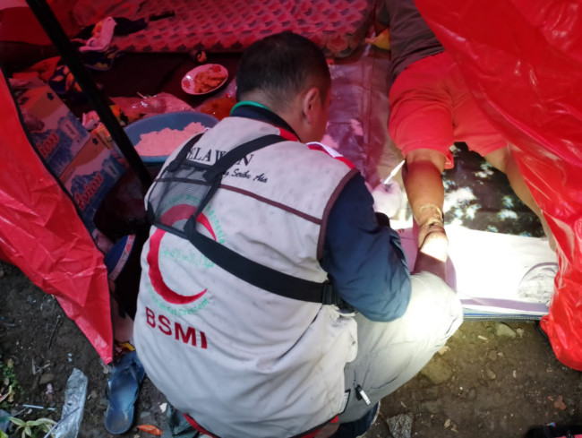 Tim Medis BSMI Tembus Daerah Sulit dengan Sepeda Motor Mobile Clinic